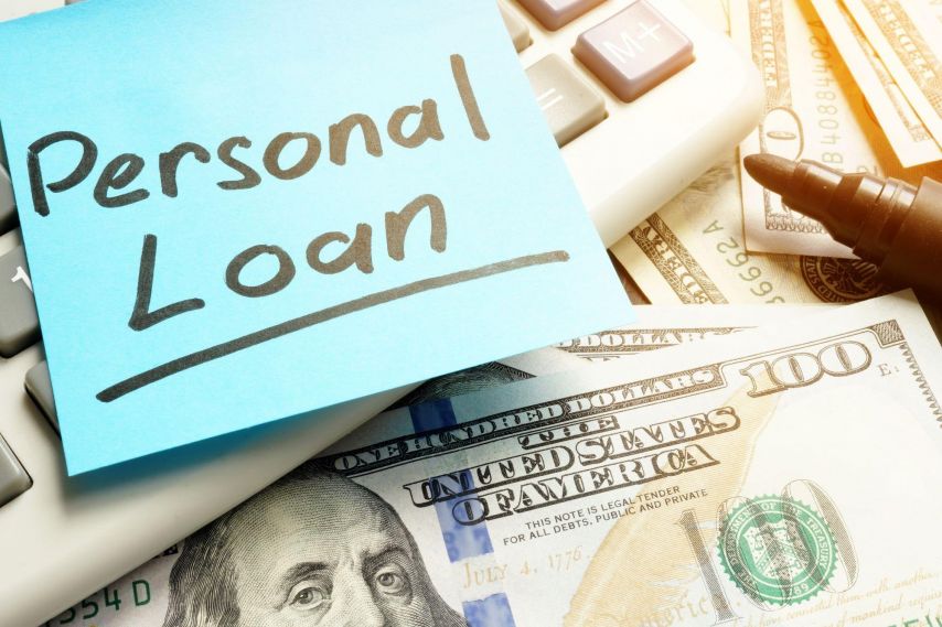 Personal loan sticky note with cash