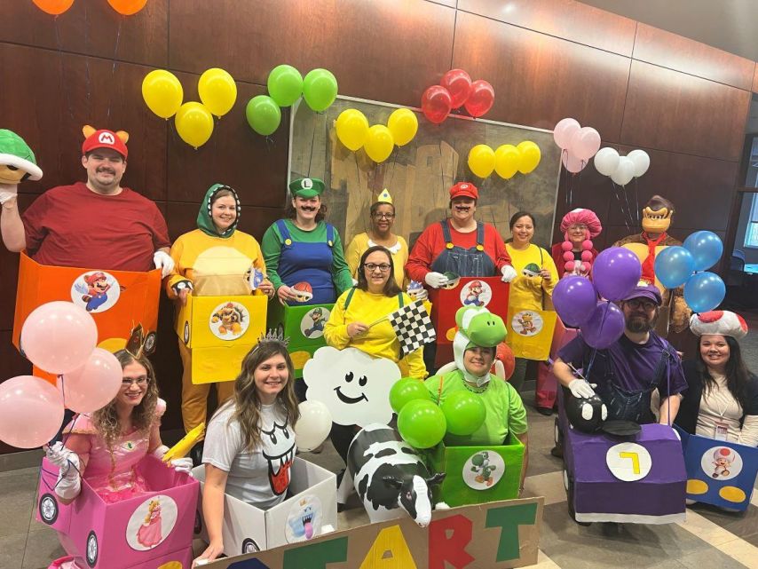 Ascend team members dressed in Mario themed costumes